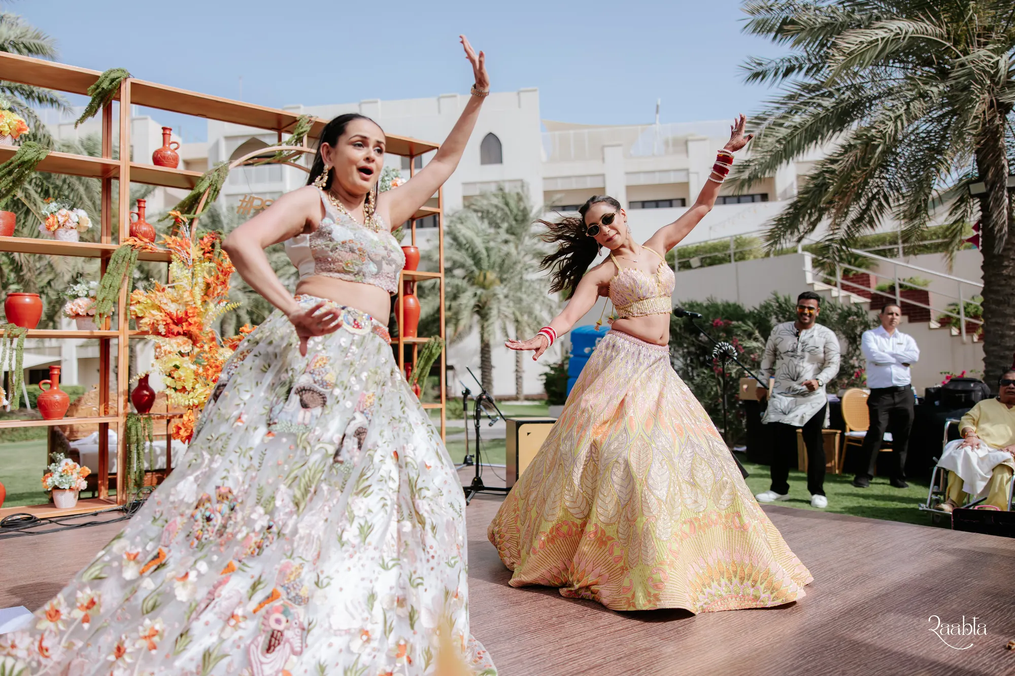 The bride dancing in the sun at Shiven and Palak's wedding, Sofitel Bahrain