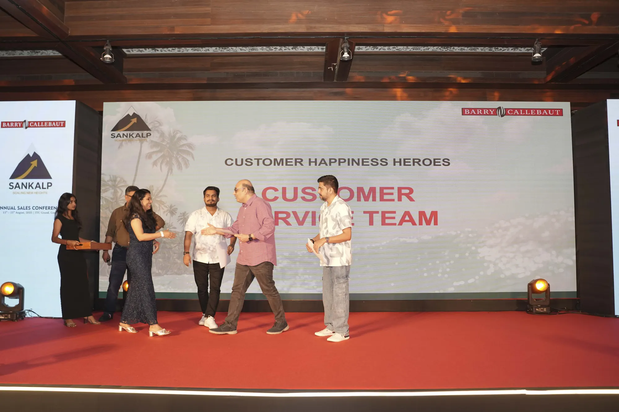 Customer Happiness Heroes award on stage at Barry Callebaut's Sankalp conference