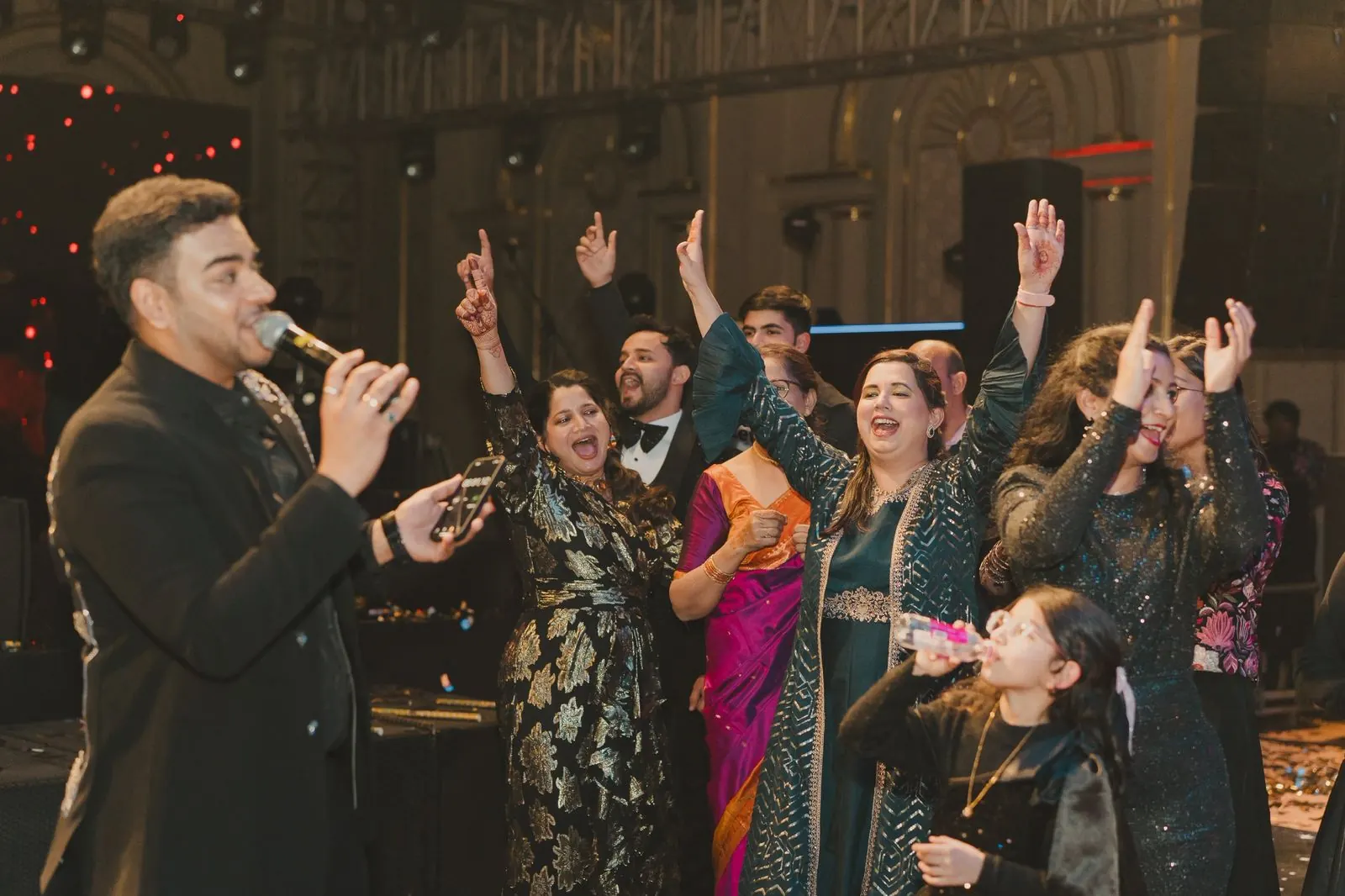Chirag Vithalani singing with guests at night at Jinali and Harshit's wedding, Jaipur