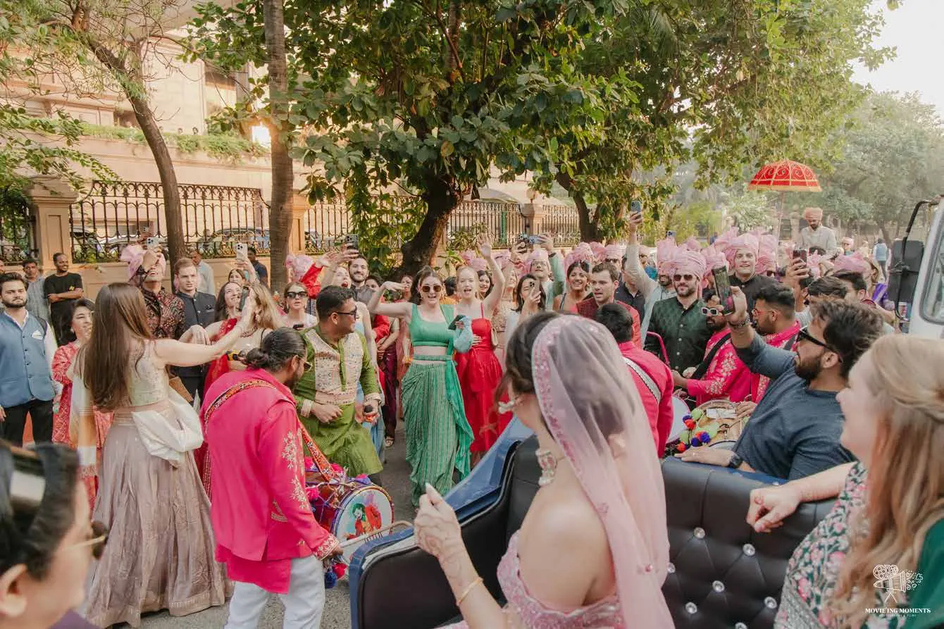 Guests cheering at Kyja and Jai's wedding at Taj Lands End, Mumbai