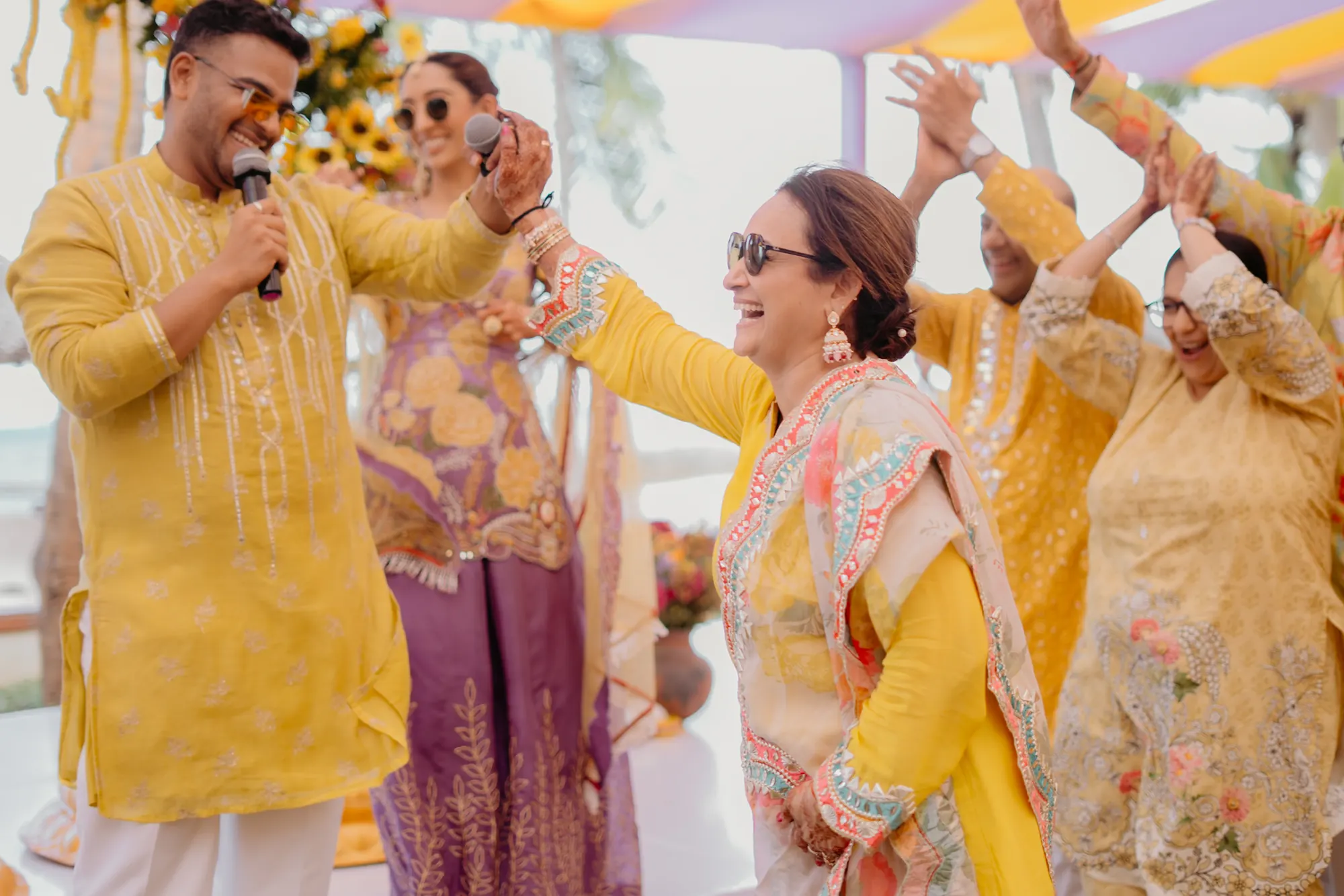 Chirag Vithalani hosting Dhwani and Vishal's haldi by the sea in Tanzania